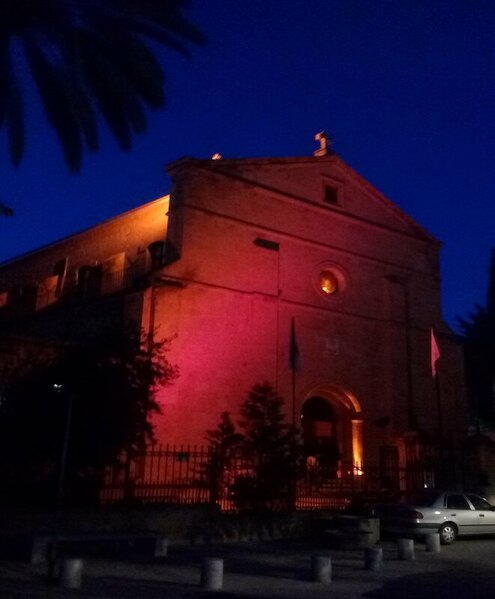 The Holy Cross Catholic Church with natural dusk lighting but grain. Buffer Zone area, Nicosia