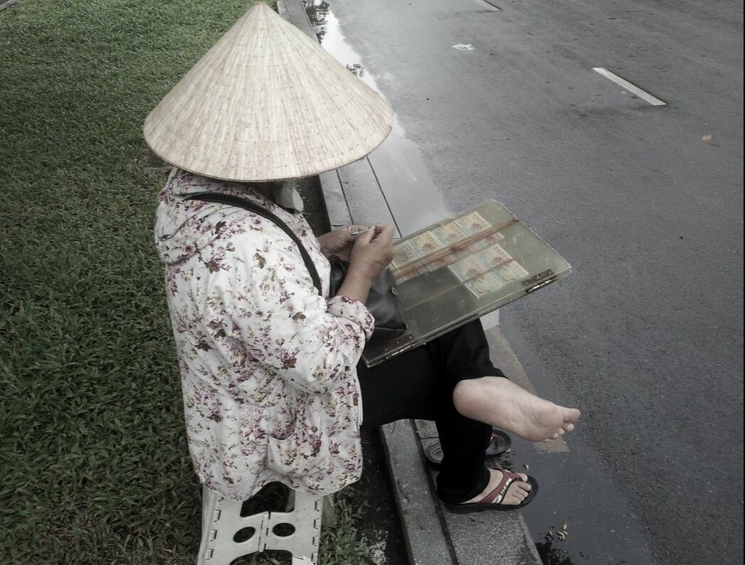 Vietnam street-photography, Lottery seller on the street
