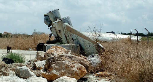The same half wreckage plane near Lakatameia Airfield, Cyprus, Douglas DC6, N19CA  Airplane